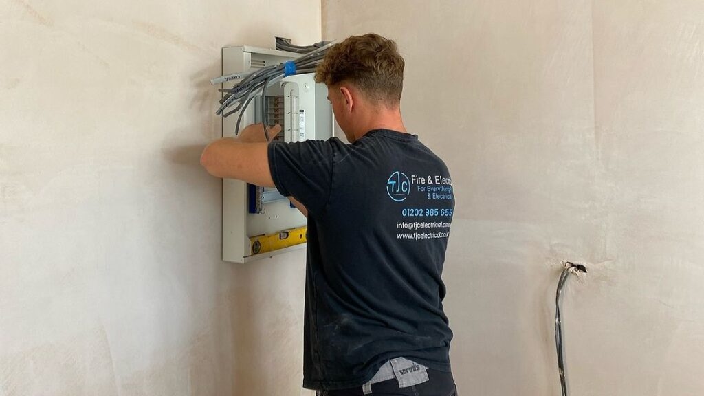 Electrician carrying out electrical testing